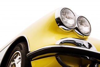 Classic car with close-up on headlights