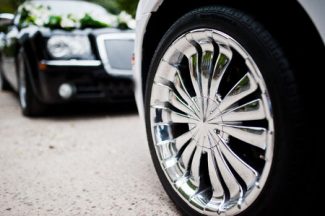 54292800 - stylish and cool chrome wheels on wedding car