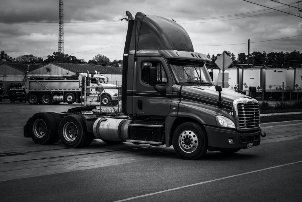 semi trailer truck in black and white